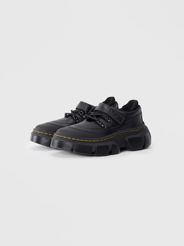 Scarpa stringata di Dr. Martens in nero