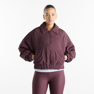 new balance Tussenjas 'Woven Bomber Jacket' in Bruin: voorkant