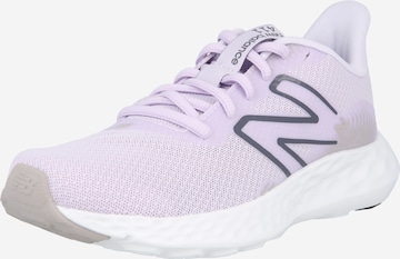 Chaussure de course '411' new balance en violet : devant