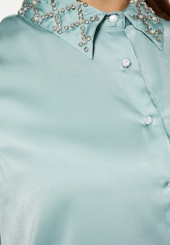 Camicia da donna di faina in verde