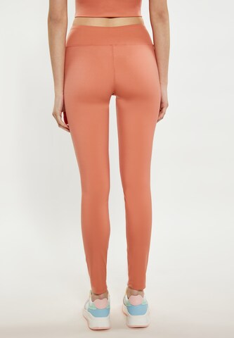 myMo ATHLSR Skinny Workout Pants in Orange