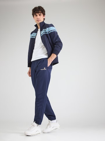 Sergio Tacchini Zwężany krój Spodnie sportowe 'Carson 021' w kolorze niebieski