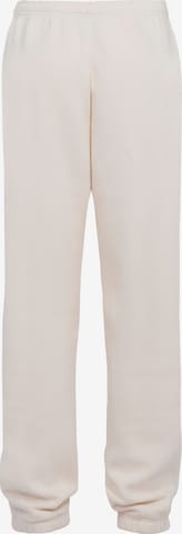 UNFOLLOWED x ABOUT YOU Tapered Broek 'CREW' in Beige: terug