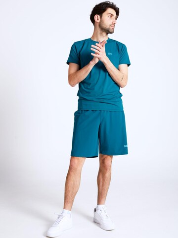 Regular Pantalon de sport 'Shorts' SPORTKIND en vert
