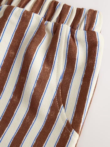 Set Next en marron