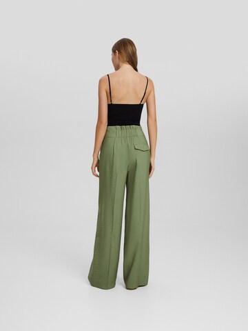 Bershka Wide leg Pleat-Front Pants in Green