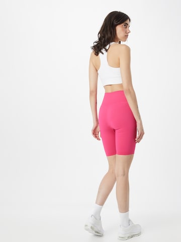 Skinny Pantaloni sportivi di aim'n in rosa