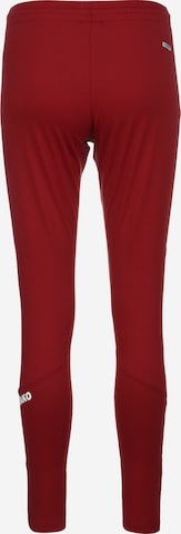 Skinny Pantaloni sportivi di JAKO in rosso