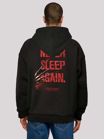 F4NT4STIC Sweatshirt 'Nightmare on Elm Street Never Sleep Again' in Zwart: voorkant