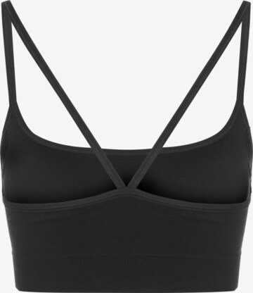 PUMA Bustier Sport bh in Zwart