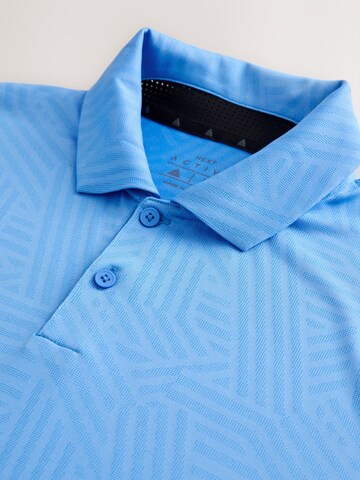 Next Funktionsskjorte i blå