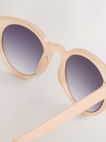 Next Aurinkolasit värissä vaaleanpunainen