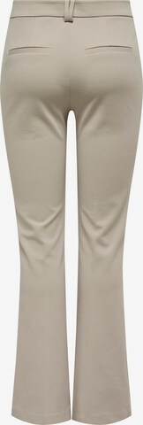 Flared Pantaloni con piega frontale 'PEACH' di ONLY in beige