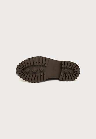 Boots chelsea di TOMS in marrone
