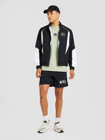 Nike Sportswear Between-season jacket 'AIR' in Black