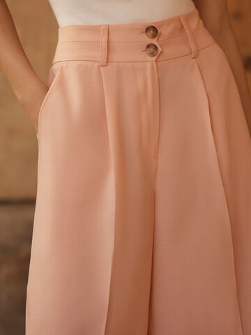 Wide leg Pantaloni con piega frontale di love & roses in rosa