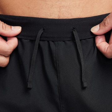 NIKE Regular Workout Pants 'CHALLENGER' in Black