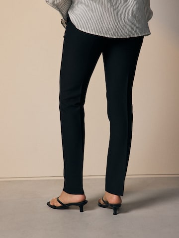Next Slimfit Kalhoty s puky – černá