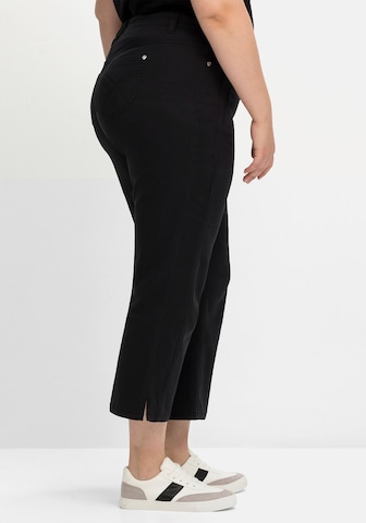 SHEEGO - Slimfit Pantalón en negro