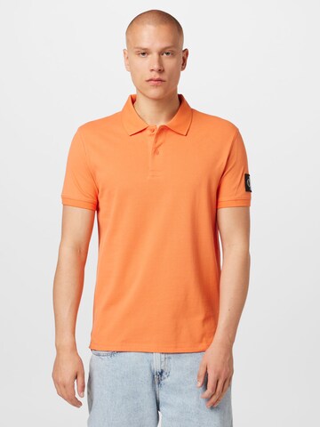 Calvin Klein Jeans - Camisa em laranja: frente
