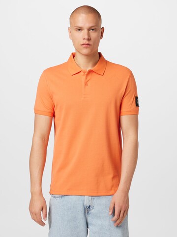 T-Shirt Calvin Klein Jeans en orange : devant