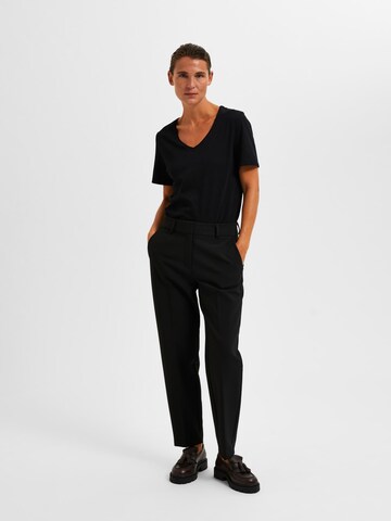 SELECTED FEMME Tapered Housut 'RITA-RIA' värissä musta