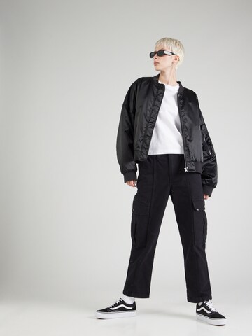 VANS - Loosefit Pantalón cargo 'SIDEWALK MUSIC ACADEMY' en negro