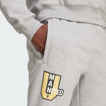 ADIDAS ORIGINALS Tapered Trousers 'Manchester United' in Grey