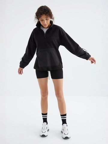 Sweat-shirt Tommy Life en noir