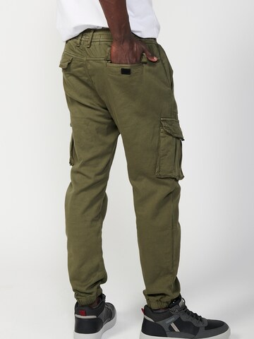 KOROSHI Tapered Cargobroek in Groen