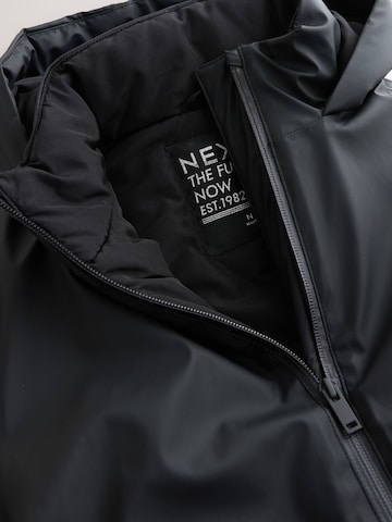 Next Mantel in Schwarz