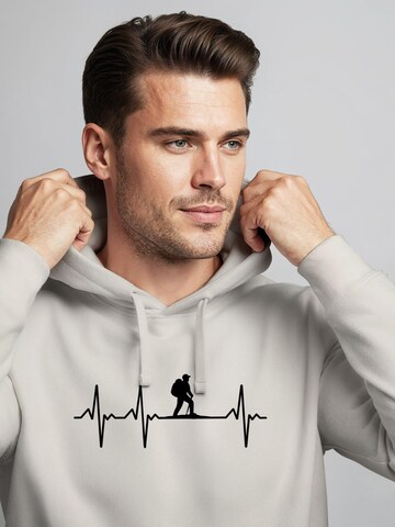 Neverless Sweatshirt 'Wanderer Herzschlag' in Beige