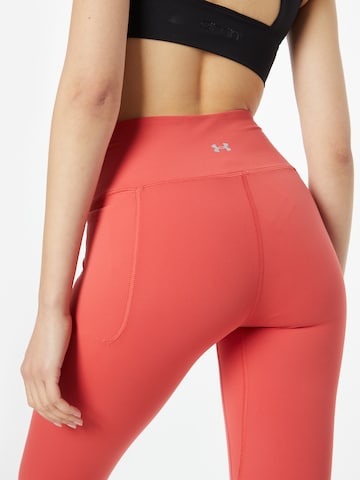UNDER ARMOUR Skinny Sports trousers 'Meridian' in Red