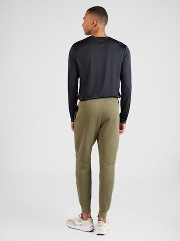 Effilé Pantalon 'TECH FLEECE' Nike Sportswear en vert