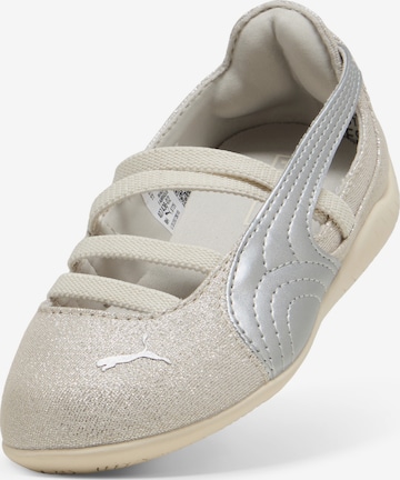 Baskets PUMA en beige : devant