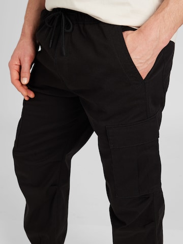 Effilé Pantalon cargo HOLLISTER en noir