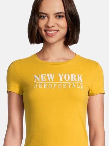 AÉROPOSTALE T-Shirt 'JULY NEW YORK' in Gelb