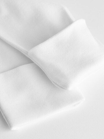 Next - Pijama entero/body en blanco