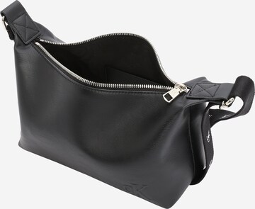 Sac bandoulière Calvin Klein Jeans en noir