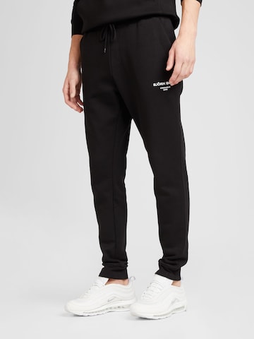 BJÖRN BORG Tapered Sportbroek 'ESSENTIAL' in Zwart: voorkant