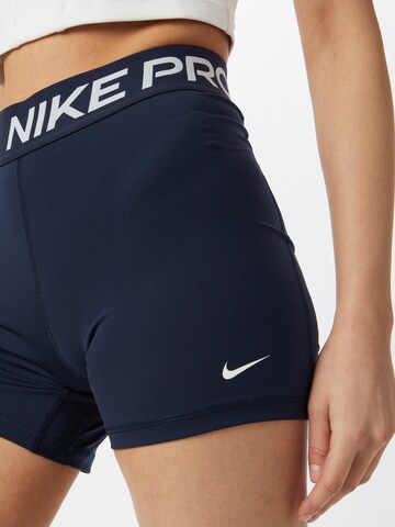 NIKE Skinny Spodnie sportowe 'Pro 365' w kolorze niebieski