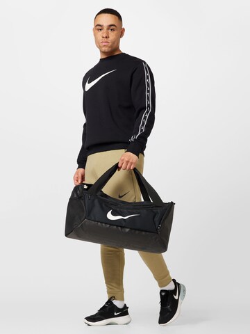 Nike Sportswear - Sudadera en negro