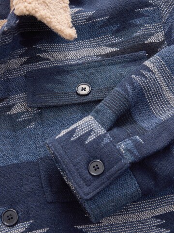 Next Tussenjas in Blauw