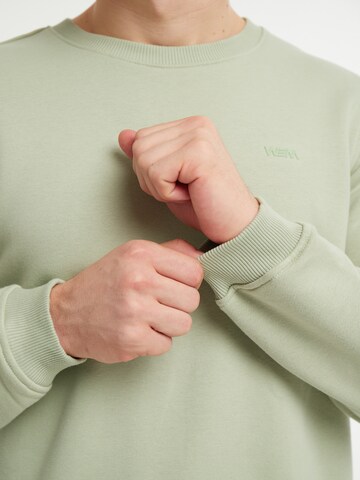 Sweat-shirt 'Spell' WEM Fashion en vert