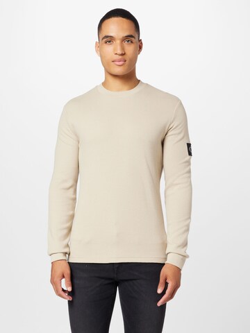 Calvin Klein Jeans Koszulka w kolorze beżowy: przód
