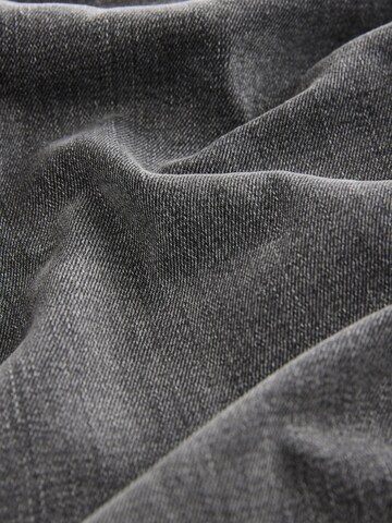 Loosefit Jeans di Next in grigio