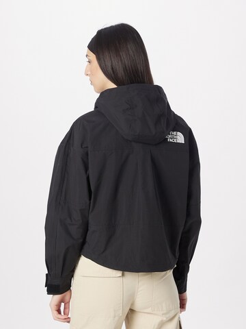 melns THE NORTH FACE Starpsezonu jaka 'REIGN ON'