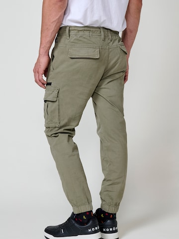KOROSHI - Tapered Calças cargo em verde