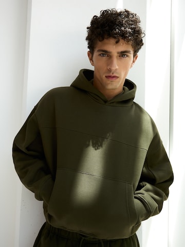 Bluză de molton de la Bershka pe verde