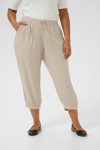KAFFE CURVE Tapered Trousers 'Mille' in Beige: front